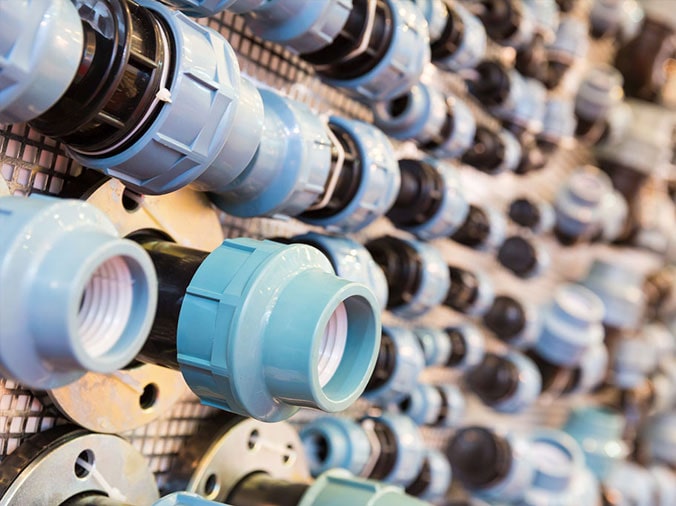PVC uniont fittings in a plumbing supply store